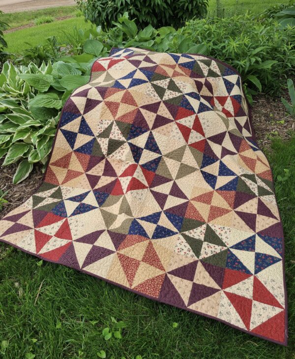 Hidden Gems Quilt made with Kansas Troubles fabric