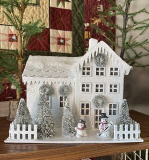 Lighted White Farmhouse